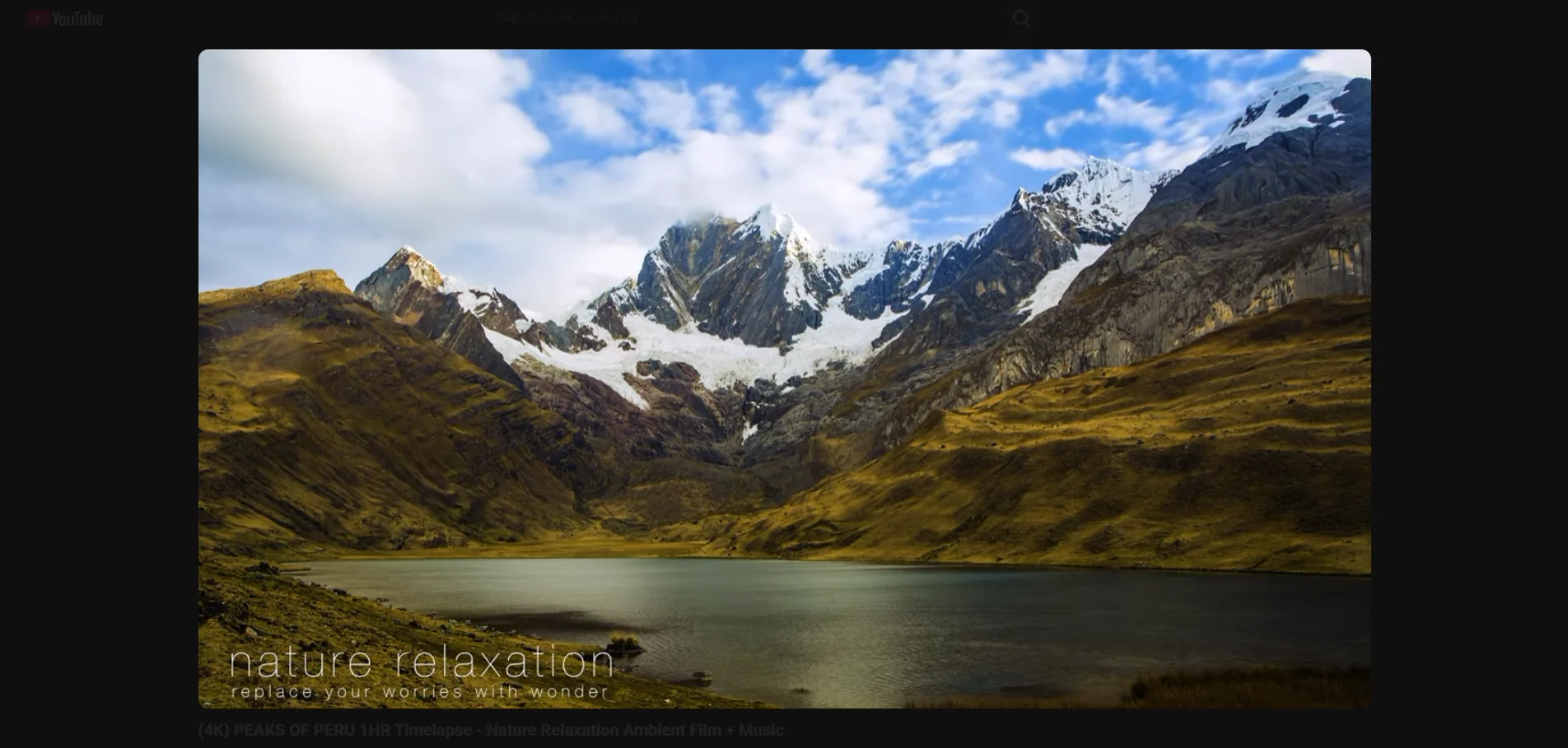 YouTube video watch page with Essentialist applied: distraction-free player with sidebar and recommendations hidden